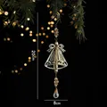 Elegant gold Christmas bell ornament with crystal drop and beads hanging on a tree - Gold Bell Style