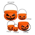 Set of 5 orange Halloween pumpkin candy buckets with handles in assorted sizes - Stackable Pumpkin Bucket Set