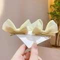 Pair of yellow mesh and ribbon bow hair clips for girls displayed on a white card - 1 Pair Pack / Yellow