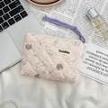 Detail of pink floral quilted pouch with bunny print and purple rope handle - Purple Bowknot Rabbit