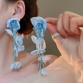 Blue layered petal beaded earrings with long tassels on model for beach vacation style - Blue Chiffon Flower Tassel (18#)