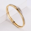 Elegant gold-plated stainless steel bracelet with Greek key pattern and cubic zirconia - Gold