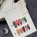 Detail showing 3D Christmas press-on nails with Santa and elk charms on display card - 1217-Christmas Gift