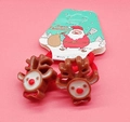 Pair of Christmas deer hair ties with red elastic bands on festive card packaging - Deer Decoration
