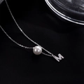 S925 silver necklace with white pearl and pave zircon letter M pendant on black texture - Letter M