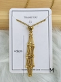 Close-up of golden tassel necklace pendant with bead detail on a handmade display card - 1Pc Gold Mesh Cage Pouch