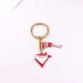 Pink revolver and star pattern bandana charms on a gold alloy western keychain - Pink Pistol & Bandana