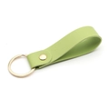Minimalist light green PU leather keychain with a polished gold metal ring and rivet - Green & Gold