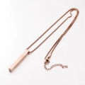 Macro detail of the rose gold rectangular bar pendant with a sleek box chain necklace - Rose Gold (MP005)