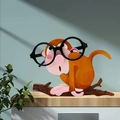 Creative monkey shaped wooden glasses holder stand in orange for desk display - Monkey