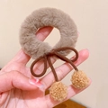 Elastic plush hair tie in brown with fur balls and a delicate bow decoration - Bow Pom Pom Style / Brown