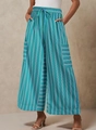 Detail of colorful striped wide leg pants featuring drawstring waist and cargo pockets - Malachite green