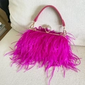 Close-up of rose red ostrich feather evening bag with crystal encrusted gold clasp - Rose Red