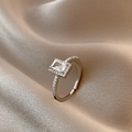 Silver square zircon ring with halo setting on champagne silk background - Adjustable Open / Silver