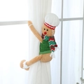 Gingerbread man curtain tieback featuring a chef hat and red green striped scarf - 21*41*12cm / Green Hugging Gingerbread Man