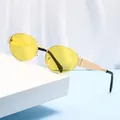 Vintage oval sunglasses with gold metal frame and yellow tinted lenses for a retro look - Gold Frame Yellow Lenses