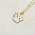 Gold pendant necklace with white enamel cat paw charm and delicate golden link chain - White