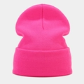 Close-up of neon pink ribbed knit beanie showing high-quality warm texture details - Fluorescent Rose Red
