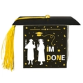 Detail of black graduation cap gift box with yellow tassel and I'M DONE print - Yellow Tassel Style / Yellow