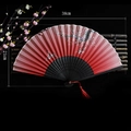 Classic folding fan with plum blossoms, red-pink gradient, black frame and red tassel - Proud Winter Plum (Red)