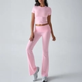 Women's pink short sleeve crop top and high-waist flared pants knit set in soft pink - S / Pink