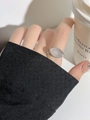 Detail of silver resin heart ring featuring a translucent oval stone on fingers - Style F Oval Moonstone Ring (X-55)