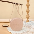 Mini round woven straw crossbody bag in soft pink color with a long rope shoulder strap - 16cm / Dusty Pink