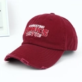 Macro shot of the distressed brim and vintage 3D embroidery on this burgundy baseball cap - Letter Embroidery Distressed Style / Burgundy