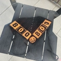 Handmade crochet Halloween bandana featuring black mesh with orange Boo and pumpkin patterns - Halloween BOO Pumpkin