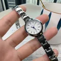 Elegant silver stainless steel ladies watch with a round white dial and blue needles - Silver Band White Dial