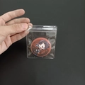 Transparent PVC zip bag protecting a round cartoon badge with character print - Zip Lock Bag 8*9.5cm - 26 Silk