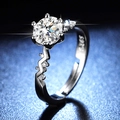 Detail of S925 silver ring featuring a six-prong round moissanite and zigzag diamond band - Y133 Zigzag Line Pave