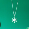 Silver stainless steel snowflake pendant necklace with delicate O-chain on green background - Snowflake Type A / Silver