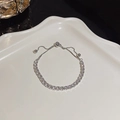 Adjustable silver tennis bracelet with round white zircons on white ceramic plate - S175 Silver