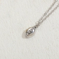 Silver necklace with sun zircon fish tail pendant and seven embedded small zircons - Geometric Oval / Silver