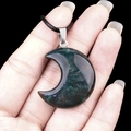 Dark green natural stone moon pendant necklace with silver clasp on black cord - 30mm Indian Agate