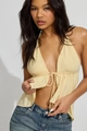 Detail of light yellow sleeveless halter top with plunging V-neck and ruched hem design - S / Yellow