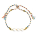 Detailed shot of green braided bracelet with white glass pearls and gold charms - Blue Yellow Pink White Mixed (BE1681GD02)