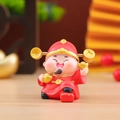 Detailed macro shot of a resin God of Wealth figurine in festive red and gold colors - 1081-10 Charging for Money Caishen
