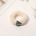 Detailed view of plush cream scrunchie with a festive green Christmas tree charm - Christmas Plush Hair Tie - Christmas Tree
