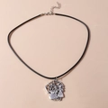 Detail of Halloween necklace featuring silver spider web, spider, and witch charms on black cord - Witch and Spider Web Necklace