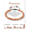 Adjustable sunstone beaded bracelet with black woven cord on a white display card - Sunstone