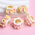 Five handmade winter colorful resin beads with LOVE lettering for DIY phone chains - Yellow Clear Bead Pink White Cream Love