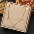 Détail d'un collier double épaisseur doré avec pendentifs cœurs et œil bleu maléfique - Style de Coeur de Mauvais Oeil Double Couche (4#)