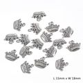 Macro shot of vintage silver alloy crown charms with dimensions L 15mm x W 18mm - Crown / 15x18mm