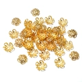 Close-up of golden iron filigree flower bead caps for DIY jewelry making and crafts - 8mm-200Pcs Per Bag / Gold