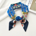 Artistic silk twilly scarf with blue and orange geometric prints tied in a bow - Domino Royal Blue