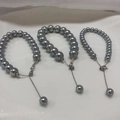Macro shot of gray-blue pearl bracelets with S925 silver clasp and adjustable chain - 925 Silver-Aurora Silver Blue (8mm)