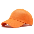 Detail view of bright orange baseball cap with shimmering sequins and mesh texture - 56-60cm / Orange