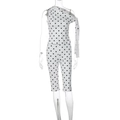 Dettaglio del set due pezzi bianco a pois neri caratterizzato da tessuto elasticizzato - S / Bianco